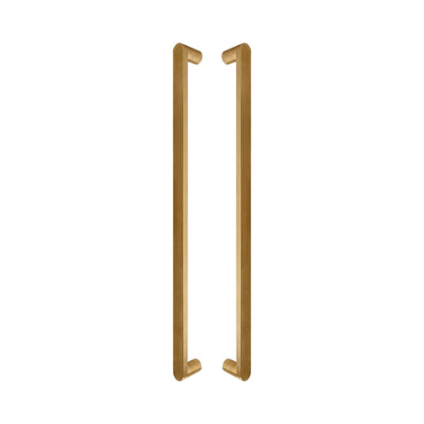 Cascade Bar pull handles in solid brass, a pair shown back to back with the round legs facing inward
