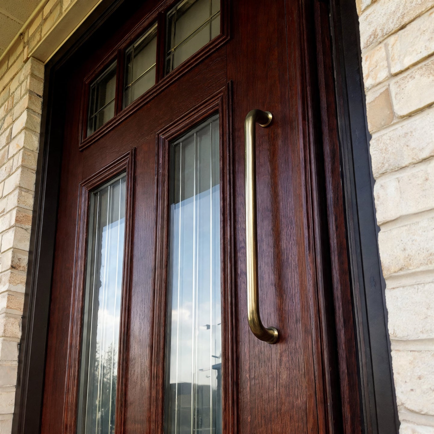 Straight D-Pull Handle on traditional timber entrance door