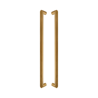 Cascade Bar pull handles in solid brass, a pair shown back to back with the round legs facing inward