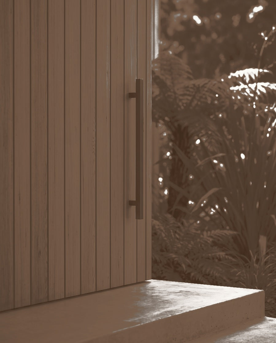 Square T-Bar pull handle 25mm in bronze on a vertical timber entrance door